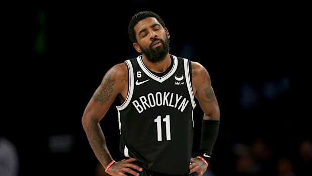 Kyrie Irving sighs after a foul call.